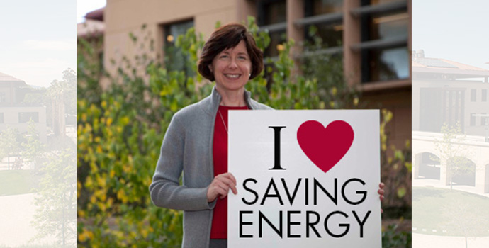 staff with i love saving energy sign