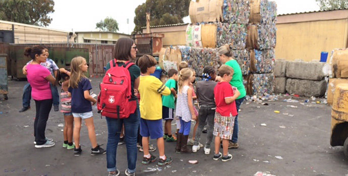 children at the recycling center