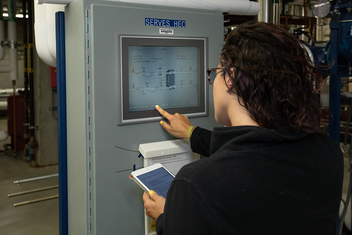 Person reading a machine display