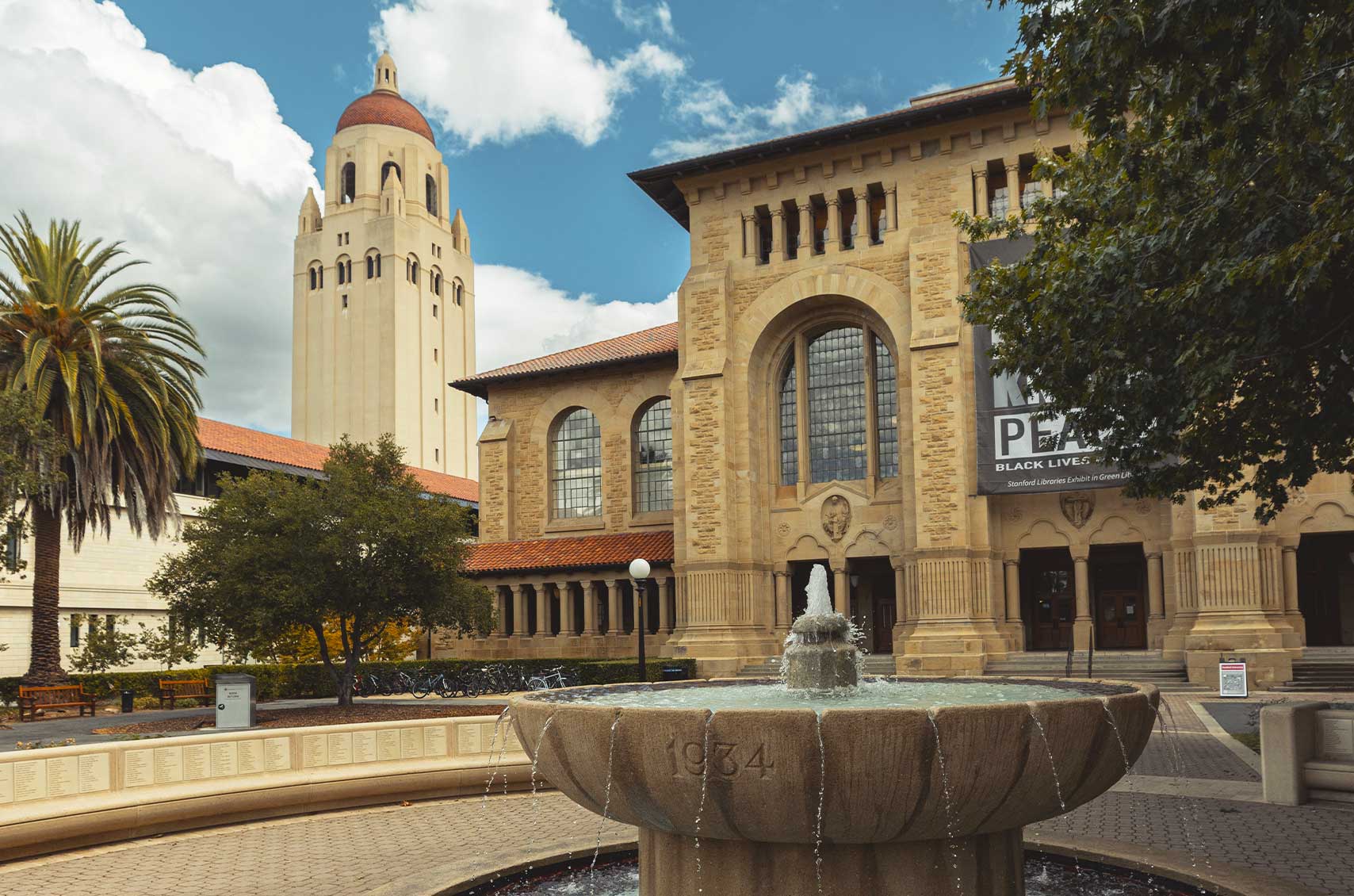 Stanford Green Library and fountain outside.