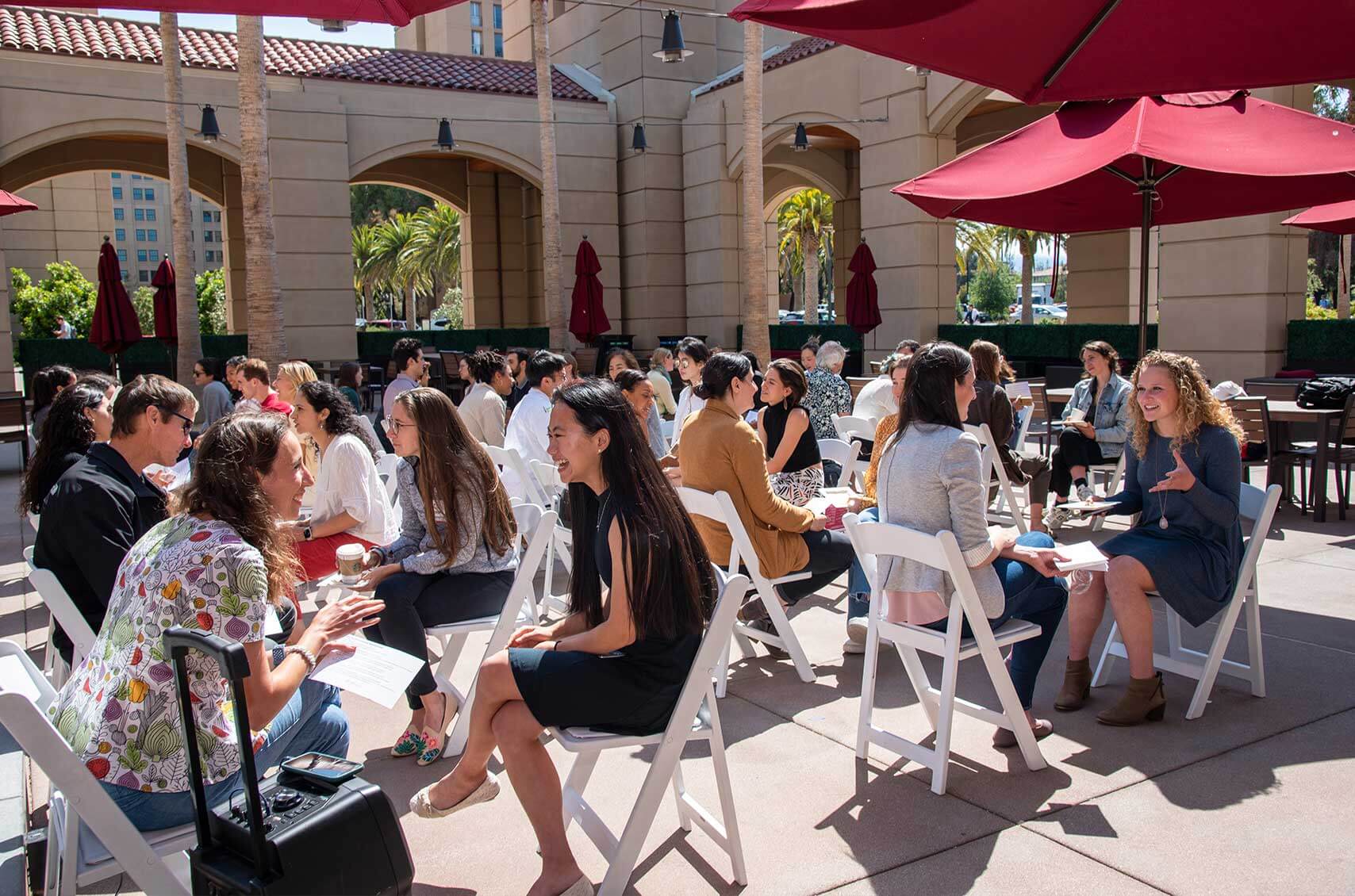Networking at Stanford Food Institute Research Symposium.