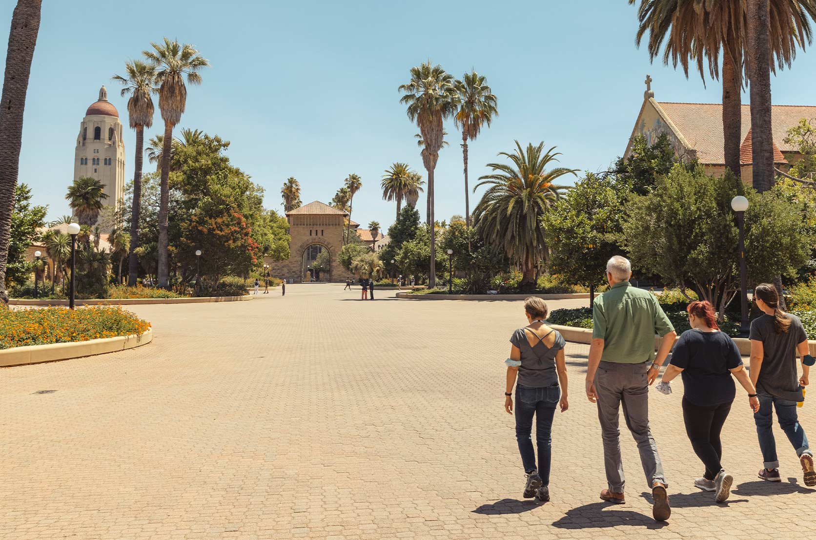 Walking walking on campus on a beautiful, sunny day.