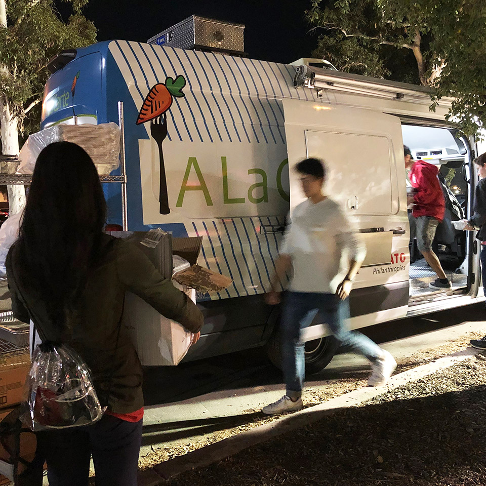 Collecting food scraps to distribute to people in need