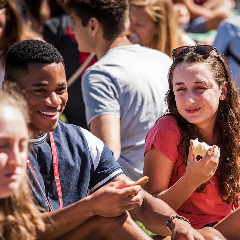 Stanford dining students eating outside